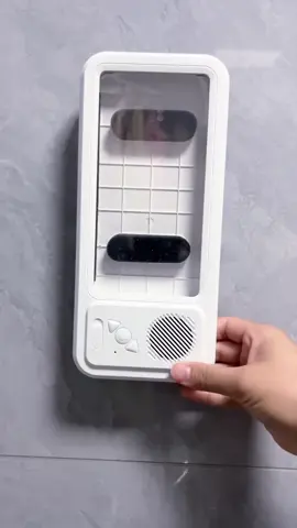 Enjoy music, shows, or podcasts in the shower with this waterproof phone cover and built-in Bluetooth speaker. Touchscreen-friendly design lets you scroll and control your phone without taking it out. Fits most phone sizes and keeps your device safe from splashes while you relax. Perfect for bathroom, poolside, or outdoor use. #showeressentials #bathroomgadgets #phoneshowercover #waterproofspeaker #showerhacks   
