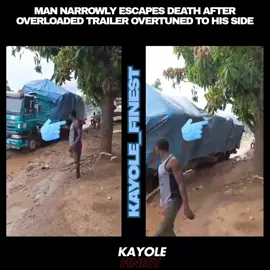 Man narrowly escapes death after overloaded trailer overtuned to his side #fyp #viral #tiktokkenya #goviral #foryourpage