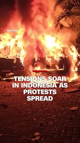 Protests erupted in multiple cities as tensions soared across Indonesia, after a delivery rider was allegedly run over by a police armored vehicle during clashes between riot police and students protesting against lawmakers’ allowances. Three people died after protesters set fire to a regional parliament building, according to a Reuters report citing authorities. #CNN #News #Indonesia