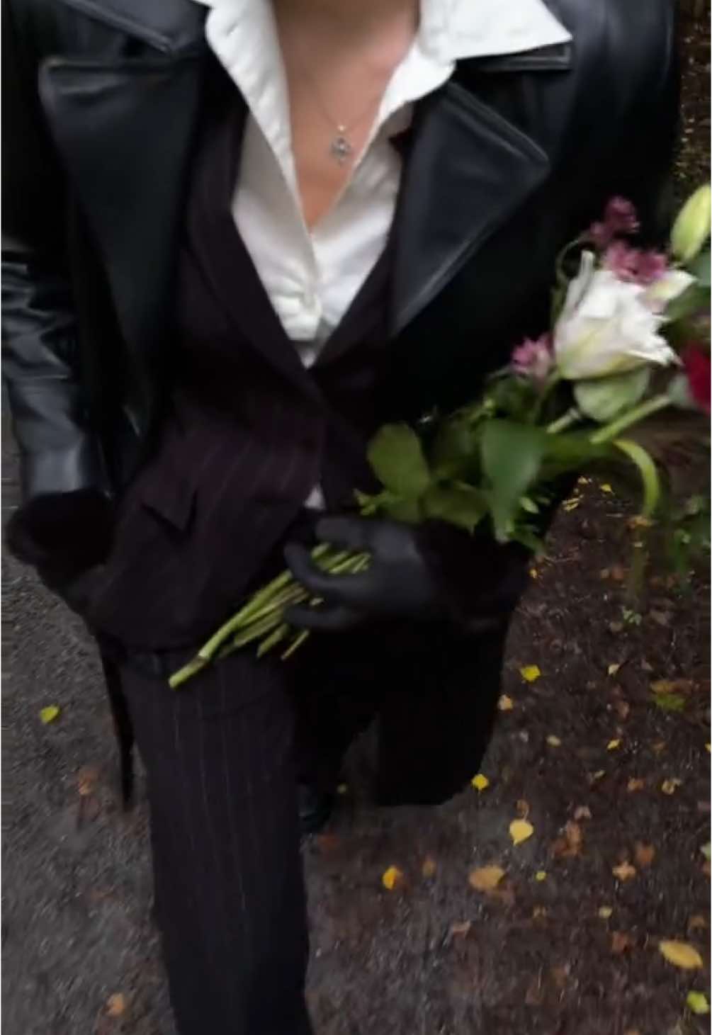 Lady in suit #womaninsuits #flowers 