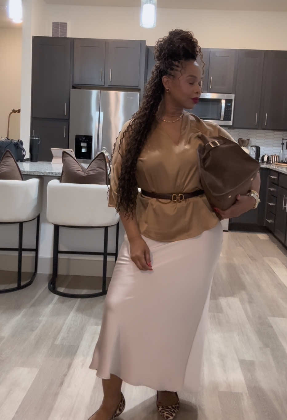 Adding the belt gave the outfit shape and using the 3 piece rule added balance. Use 3 pieces of clothing/accessories to complete an outfit. Top bottom and the 3rd piece can be a belt blazer sweater or a piece of jewelry. Do you use this rule? Let me know in the comments. #corporatechic #ootdinspo #fallinspo #tiktokover50 #styleinspo 