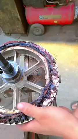 labourer repairs an electric vehicle using a machine #repairing #manufacturing #welding #restoration 
