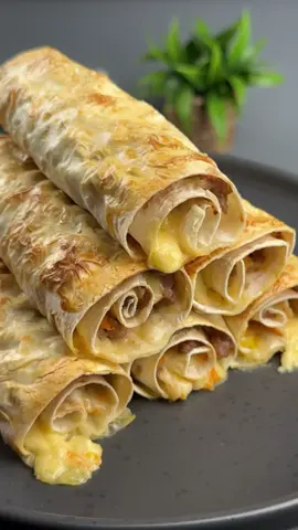 #VNVideoEditor                                       DELICIOUS MINCED MEAT IN PITA is a MUST-TRY DISH.                                                     What's The SECRET to Making the BEST MINCED MEAT IN PITA BREAD INGREDIENTS: ●Lavash - 2 pieces ●Minced meat - 320 g (I have ground turkey) ●Salt - 1 tsp ●Black pepper - to taste ●Cheese - 200 g ●Eggs - 2 pcs ●Korean carrots - 180 g ●Bake in the oven at 180 degrees for 30-35 minutes● ●It's incredibly delicious and very simple!!!● Bon appetit! The recipe in your language is available in the description, 💖🇺🇦🇵🇱🇩🇪🇺🇸🇫🇰🇪🇸🇵🇹🇮🇹🇷🇴 🇷🇸🇭🇷🇱🇻🇸🇮🇨🇿🇫🇮🇸🇪🇩🇰🇳🇴 🇯🇵 🇬🇷 🇮🇱🇰🇿🇰🇬🇱🇻🇹🇼 🇵🇪 🇦🇷 🇨🇱 🇻🇪 🇹🇭 🇧🇷                         #pitabread #lavash #breakfast #simplydeliciousrecipes 