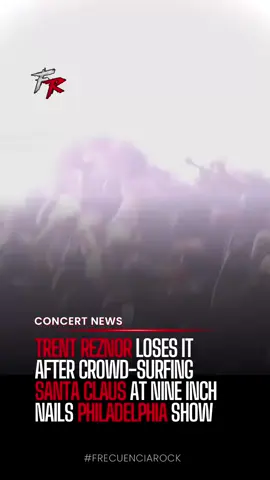 Nine Inch Nails’ Philadelphia concert on August 27 turned unforgettable when a fan in a full Santa Claus suit crowd-surfed during “Head Like a Hole.” Trent Reznor noticed and completely lost his composure, stopping mid-verse as he laughed at the surreal scene. The moment, captured on video and shared widely on TikTok and Instagram, has quickly gone viral. One fan summed it up perfectly: “It’s hard to stay angry when Santa is crowd surfing in front of you.” • • • • • • • • • • • • • #frecuenciarock #nineinchnails #trentreznor #santaclaus #moshpit          