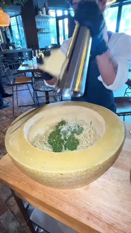 Timpano Hyde Park Tampa Florida 10/10!!!! 🍝 As a pesto lover, This Parmesan cheese wheel was imported from #italy & Timpano makes their own pesto sauce from starch. I paired it with chicken and tomatoes( normally I choose sun-dried tomatoes but this did the job) such an experience & phenomenal customer service.  #parmesanwheel #tamparestaurants #viral #fyp 