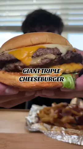 giant and messy triple cheeseburger with poutine fries 🤤 🍔 🍟 this burger was insanely good!  location: beefy’s reno, nv #burger #mukbang #Foodie #foodtiktok #viral #fries #notalking #asmr #food #mukbangeatingshow 