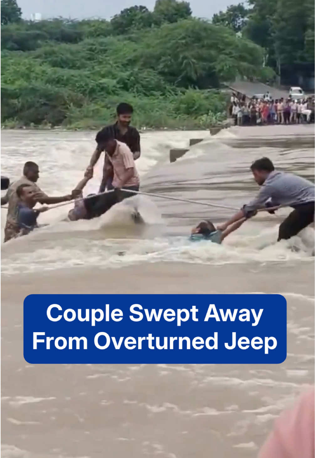 Watch as people banded together to rescue this couple from being washed away by floods in India. #TheWeatherChannel #fyp #India #jeep #rescue #flood #weathertok #weatherchannelmusic 