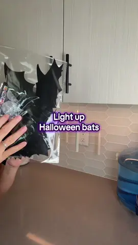 LED Halloween bat decorations - super easy, just peel and stick anywhere. A great family activity - the kiddos will love this #halloweendecor #batdecor #halloween #familytimefun  #wednesdayaddams 