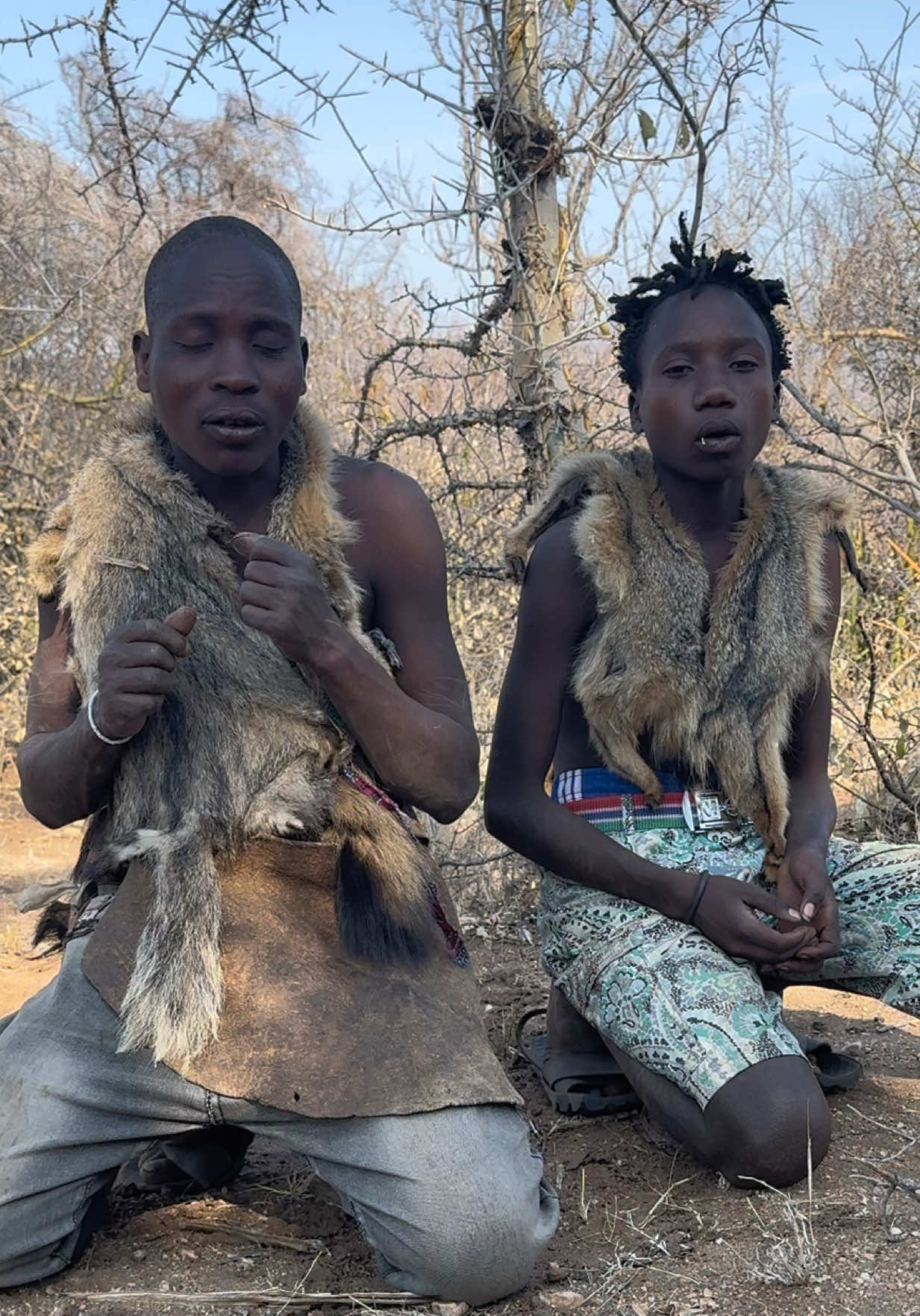 Tribal vibes with Gingidaa 😇🎵” Gingidaa and his friend singing a Hadzabe tribal song—soothing, rhythmic, and full of culture 🥰. Every beat feels like the heart of the jungle ❤️. #gingidaa #sing #singing #roamingwithvinu #hadzabetribe 