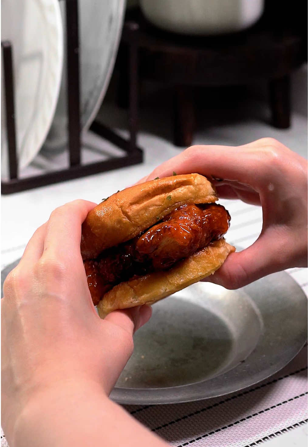 DIY your own hot honey sliders that you’ll crave daily 🤤 Hot Honey Chicken Slider Recipe ✨ Marinade Ingredients: 1. 1/4 cup of pickle juice 2. 1/4 cup of hot sauce 3. 200ml of buttermilk 4. 2 chicken breasts, cut half 5. 2 teaspoons of garlic powder 6. 2 teaspoons of onion powder 7. 2 teaspoons of cayenne powder 8. 1 teaspoon of paprika 9. 1 teaspoon of mustard powder 10. 1/2 teaspoon of black pepper 11. 1/2 teaspoon of salt 12. 1/2 teaspoon of msg Dredge Ingredients: 1. 1 1/2 cup of flour 2. 1/2 cup of cornstarch 3. 2 teaspoons of garlic powder 4. 2 teaspoons of onion powder 5. 2 teaspoons of cayenne powder 6. 1 teaspoon of paprika 7. 1 teaspoon of mustard powder 8. 1/2 teaspoon of black pepper 9. 1/2 teaspoon of salt 10. 1 teaspoon of baking powder Procedure: 1. Place the marinade ingredients in a large bowl. Mix well. 2. Refrigerate the chicken in air-tight container for an hour or up to overnight. 3. In a second bowl. Add the dredge ingredients. Mix well. 4. Dredge one chicken through the flour mixture, making sure it’s completely coated. 5. Deep fry the chicken in batches for 8-10 minutes or until golden brown. Transfer to a clean plate. 6. Combine the Chicken Tenders with our homemade Hot Honey sauce. Mix well. 7. Serve with some patties. Enjoy! 🫶🏻 #hothoneychicken #friedchicken #crispychicken #chickensandwich #crispychickensandwich  