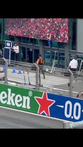 Lando Norris passing under the podium when Oscar Piastri is named at Zandvoort 2025  #landonorris #oscarpiastri #mclarenf1 #zandvoort #dutchgp 