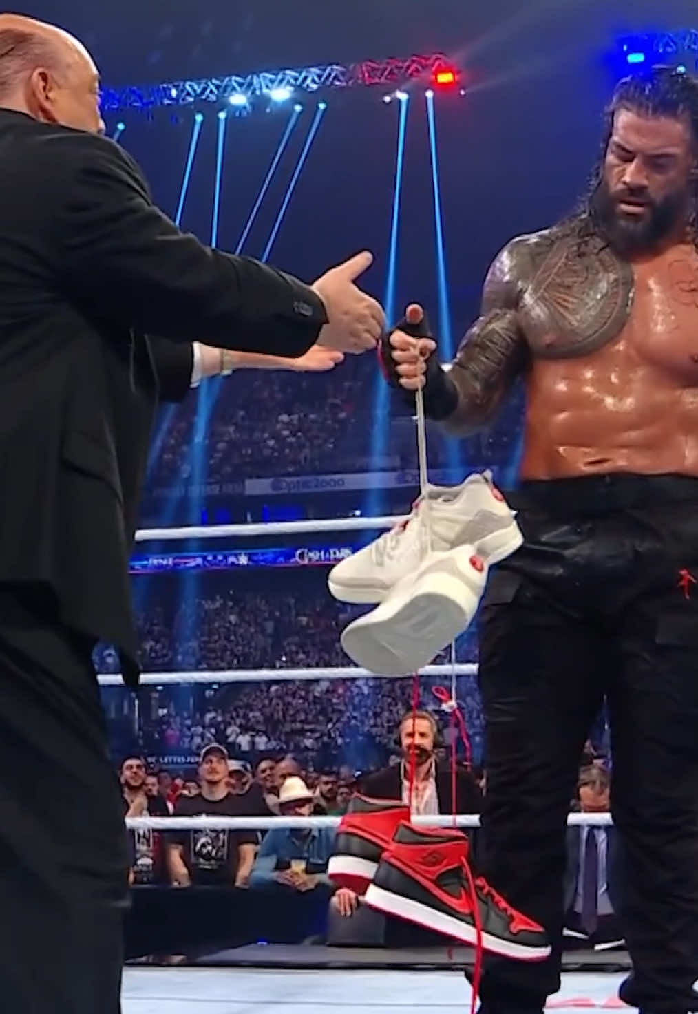 THE OTC1 GETS HIS SHOES BACK AND HEYMAN GETS WHAT HE DESERVES 👏👟 #WWEClash #WWE #RomanReigns #PaulHeyman 