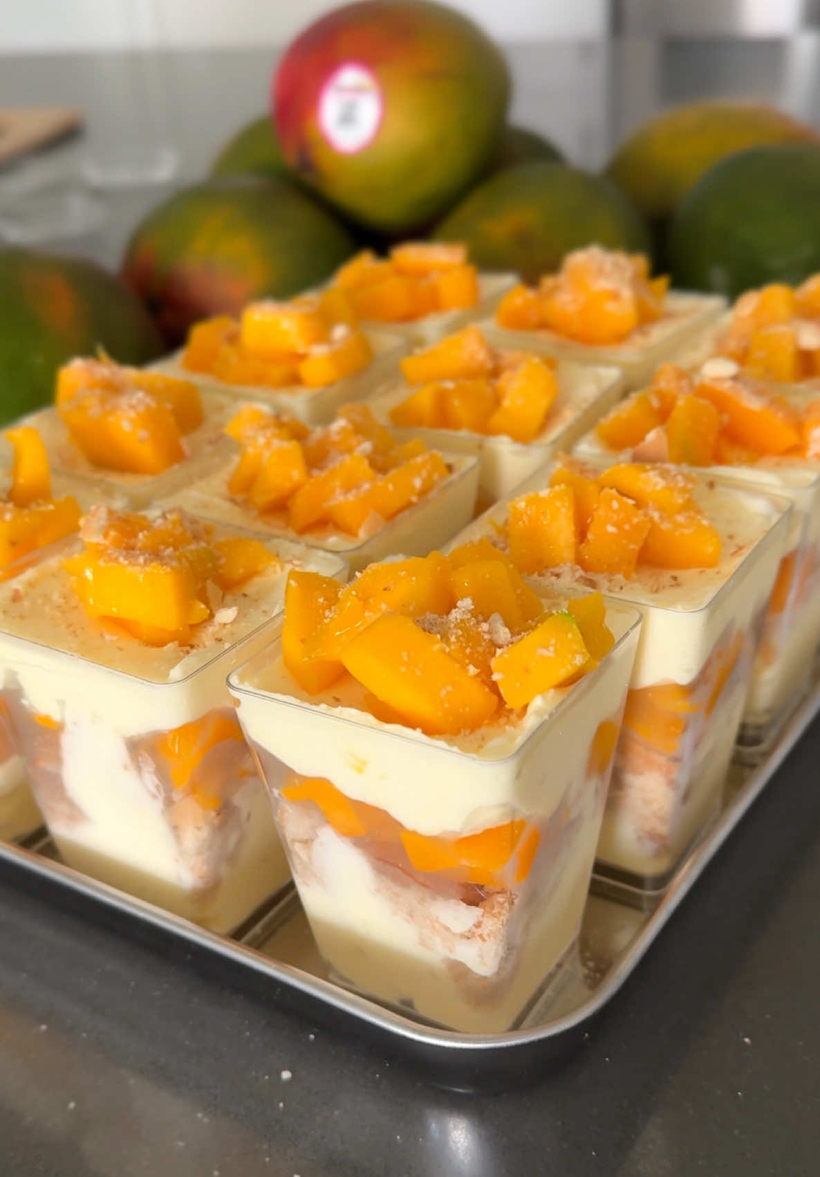 magnolia’s pudding, but in her mango era 🥭✨ here’s my take on the famous @Magnolia Bakery banana pudding. 🍌 recipe 🔎 google “jenhdao mango pudding” Ingredients:     •    1 (14 oz) can sweetened condensed milk     •    1 ½ cups ice-cold water     •    1 (3.4 oz) box instant vanilla pudding mix     •    3 cups heavy cream, whipped to stiff peaks     •    1 box Nilla wafers (or coconut cookies)     •    3–4 ripe mangoes, diced • • • • • • #Mango #pudding #magnoliabakery #mangopudding #bananapudding    