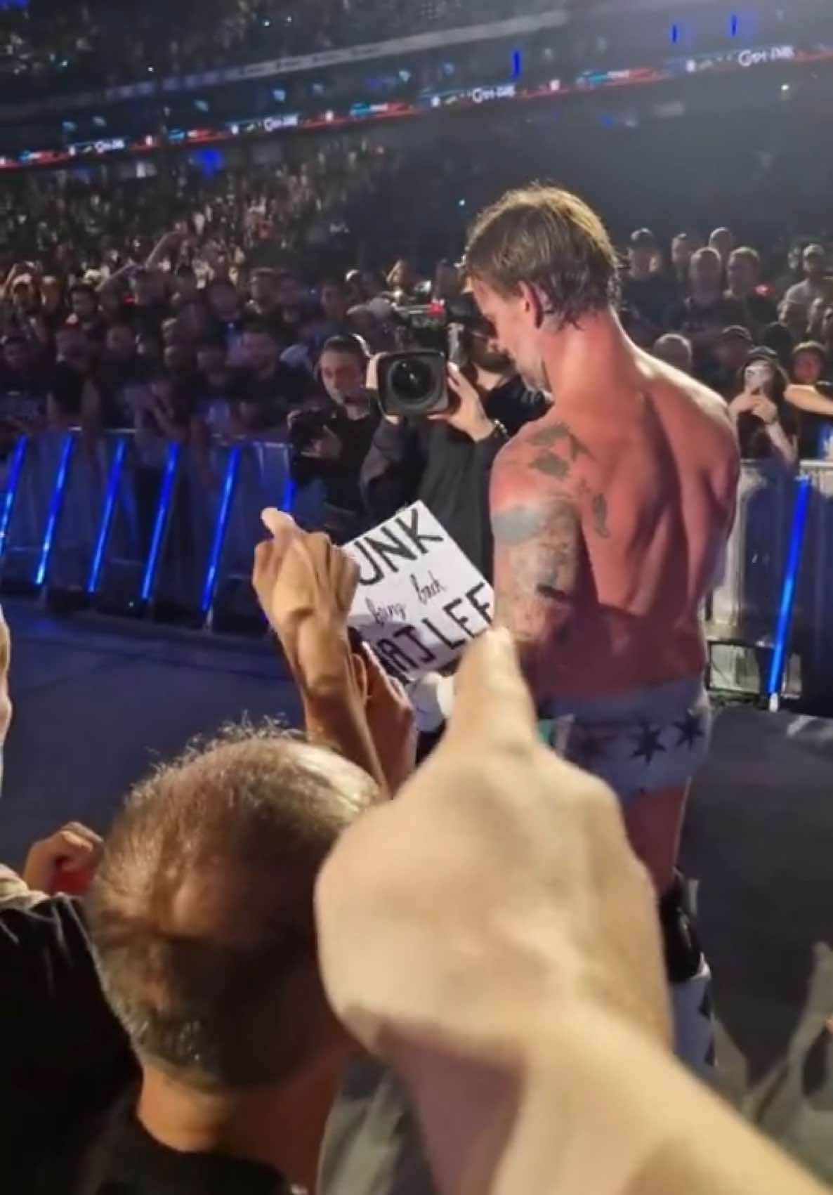 CM Punk Acknowledges Bring Back AJ LEE Sign After Clash in Paris #WWE #cmpunk #wweclash #clashinparis #ajlee 