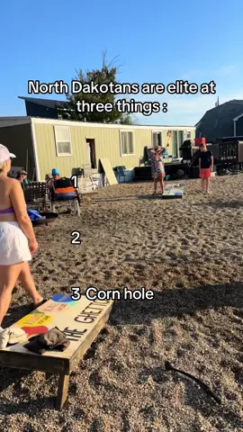 I wouldn’t challenge anyone from ND to anything outdoors or bar related from skiiing to billiards because they are very adept at dealing with winter weather and occupying their time in winter months, and very thankful for good weather so they take advantage of it. I’m from Kentucky, and I thought cornhole at horse races and football tailgates was elite—nope. Nodaks will literally play cornhole outside at a bar rooftop when it’s 40 degrees outside because they’ll do anything to be outside while they can be. I also thought my life as a lake kid was elite until I moved to North Dakota. The difference is they live on these lakes and soak up every day of sunshine. And even in the winter, they’re on the lakes ice fishing. Their lake game is next level. Finally, bar games. Never challenge a North Dakota man or woman to bar games. They put the rest of the country to shame—specifically in bar darts. #northdakota #northdakotacheck #kentuckygirl #fypシ #lake 
