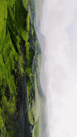 📍Somewhere unreal 🤯 Out of this world. The green, the landscape, the road.  #iceland #visiticeland #dji #nature #landscapes 