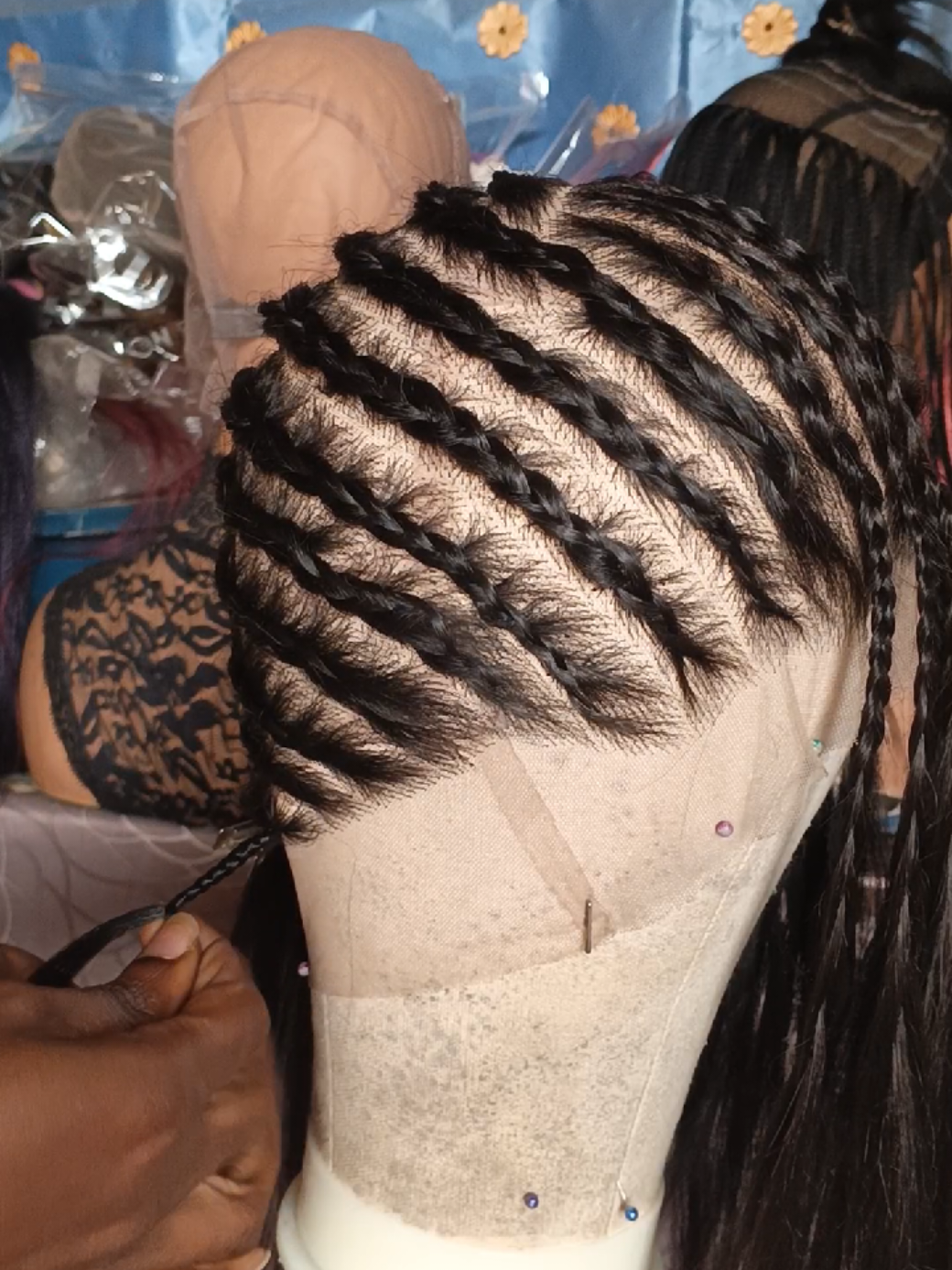 Part your full head lace into sections before you start braiding, it helps you move faster.  How to braid wigs  How to braid hair  Braided wig making  #braiding #braidstutorial #braidedwig #braidedwigseller #braidwigs 