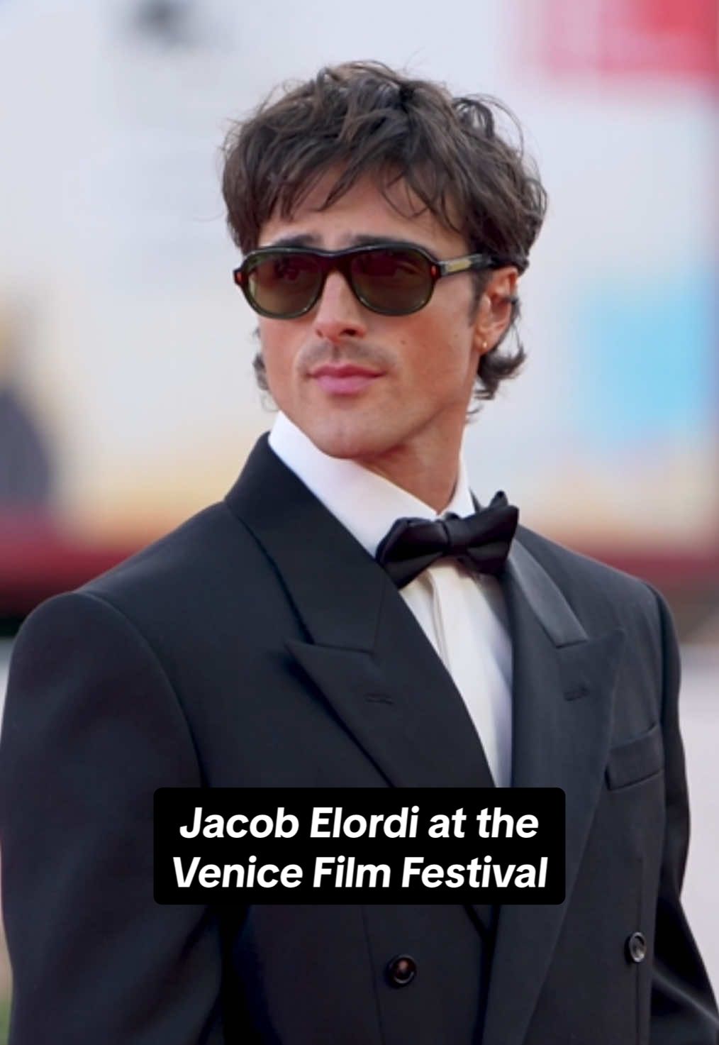 #JacobElordi made a grand entrance at the 82nd #VeniceFilmFestival, stepping off a gondola in an all-white look with oversized sunglasses. Later that day, he hit the red carpet for the #Frankenstein premiere in a classic tux, keeping the sunglasses firmly in place.