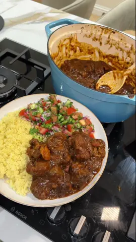 This lamb tagine is pure comfort in a bowl 🍲✨  Slow-cooked to perfection, rich, hearty, and full of warming spices. One of my all-time fave stews..here’s how to make it🥰 Lamb marinade: - 1 to 2kg lamb cubes - 1/2tbs Ras el Hanout  - 1/2tbs Baharat seasoning  - 1tbs grounded coriander  - 1/2tbs cumin - 1tbs paprika  - 1/2tsp ground tumeric - 1tsp lebanese spice  - 1tsp ground ginger  - 1/2 tsp Cinnamon  - 3 cloves crushed garlic  - Salt and pepper  - Drizzle of olive oil for marinade  Tagine: - 1 or 2 large onions, finely sliced - 4 garlic cloves, crushed - 2tbs tomato paste  - 1 cinnamon stick - Handful of prunes, pitted and apricots  - Juice of 1/2 lemon  - 4 crushed cardamom pods - 1 cup of chicken stock  - Corn starch to thicken - 10 saffron threads Garnish:  - fresh parsley  - Almonds or pistachios  Steps: 1. Marinade the lamb with the marinade ingredients and leave overnight or for atleast a few hours. 2. If you have a clay tagine pot use it and if not you can use a cast iron or stainless steel pan as an alternative. Fry over the onions with a drizzle of coriander, Bharat and Ras El Hanout.. stir until soft and slightly golden.. then add in the garlic along with the lamb and a cinnamon stick. Sear over the meat and then add the prunes, apricot, chicken stock and lemon juice. In a bowl add a cup of chicken stock, 2tbs tomato puree, saffron, lemon juice, crushed cardamom, 2tbs chopped parsley and corn starch. Add to the pan and simmer on a low heat until the sauce reduces and thickens and then place a lid on and cook until the is tender (around 2 hours). Serve with almonds, or Pistachios and you can also serve with parsley.  3. I made the meal with couscous and salad. You can also make this dish with chicken or beef. You can also add thin slices of potato on top too before serving.  Enjoy and follow for more🫶🏼🍽️   #heartymeals #tagine #homemadefood 