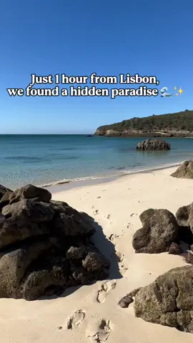 ✨ Paradise just 1 hour from Lisbon? Yes, it exists! 🌊☀️ We left early in the morning and arrived at Praia do Creiro around 8:50 AM. Even though a few people were already there, it still felt like we had the beach all to ourselves: calm water, soft sand, and that “private island” vibe. Walking along the shore, it was hard not to pause every few steps and just take it all in. Getting there is part of the adventure: a short, steep path through the bushes leads you to the beach. Not the easiest with little kids, but the reward is 100% worth it. From Coelhos, we made our way to Praia de Galapinhos, hopping over rocks at high tide (at low tide it’s a gentle walk along the sand). Here are some tips if you want to make the most of your day: ✅ Arrive early: Parking fills up fast — and if you come late, you’ll have to park on the street, and the walk to the bus can be very long. ✅ Free shuttle bus: Runs from the parking lot to the main beaches — super convenient if you want to explore without hiking back. ✅ Check tide times: High tide means climbing rocks; low tide makes beach hopping easy if you want to go from one beach to another. ✅ Bring your own umbrella/blanket: Galapinhos has rentals, but it’s always nice to have your own. ✅ Food & drinks: There’s a restaurant at Galapinhos if you need snacks or a full meal. We spent the day hopping between beaches, swimming, and just soaking in the beauty. By the time we took the shuttle back, it felt like a full day in paradise — without even leaving the region!  Save this paradise for your next trip 🏖️ or send it to your beach buddy 💕 ****************** Hi, I’m Nadine. Mom of two boys and wife to my best friend. We moved to Portugal chasing a slower, more intentional life. Follow along for family travel, expat life & parenting adventures.  From Lisbon with love, Nadine ❤️ #portugalwithkids #slowlife #lifeabroad #travelfamily #lisbonwithkids  