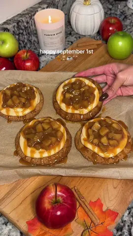 caramel apple cheesecake cookies 🤎   Ingredients 🧈🥚 cookies -3 cups flour  -¾ tsp baking soda -¼ tsp baking powder -1 tsp salt -1 cup unsalted butter softened  -1¾ cups brown sugar  -2 eggs -2 tsp vanilla apple pie filling -3 apples  -1 1/2 tbsp brown sugar  -1/3 cup granulated sugar  -1 tbsp cornstarch -1 tsp cinnamon  -1/4 tsp nutmeg  -1/4 tsp cloves  -1/4 tsp salt  -1 1/4 cups water  cream cheese frosting  -5oz cream cheese softened  -4 tbsp butter softened  -3 tbsp caramel sauce  -1 tsp vanilla  -1 1/2 cups powdered sugar  *I used store bought caramel sauce  Instructions 📝 cookies  1. Beat butter & brown sugar until light & fluffy. 2. Add egg & vanilla; mix until smooth. 3. Whisk flour, baking soda, baking powder & salt; add to wet mix. 4. Mix until just combined. 5. Scoop dough into balls & roll in extra brown sugar. 6. Chill dough balls in freezer for 2 hours. 7. Preheat oven to 350°F. 8. Place balls 2 inches apart on lined sheets. 9. Bake 12 min until edges brown & centers aren’t pale. 10. Cool on pan a few minutes, then move to a rack. apple pie filling  1. Heat saucepan on med/high. 2. Add sugars, cornstarch, cinnamon, nutmeg, cloves, salt & water. Stir until dissolved. 3. Bring to boil, stirring often. 4. Add chopped apples & stir to coat. 5. Lower heat to med/low & simmer until thick & apples are soft. 6. Remove from heat & set aside. cream cheese frosting  1. Beat cream cheese & butter until smooth and creamy. 2. Add powdered sugar & caramel; whip until light & fluffy. #fallbaking #baketok #bakingideas #dessert #fyp 