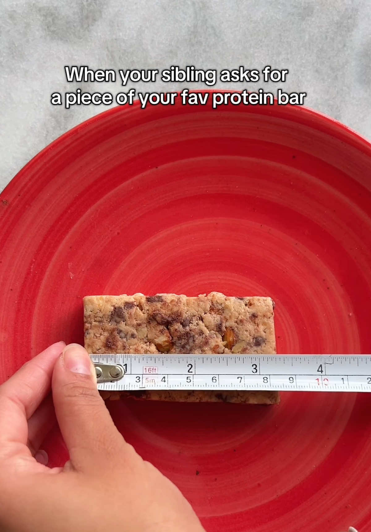 We don’t know what sharing means when it comes to our Protein bars ✋🫢 #nutrilov #pakistan #proteinbars #foryou #fypシ 
