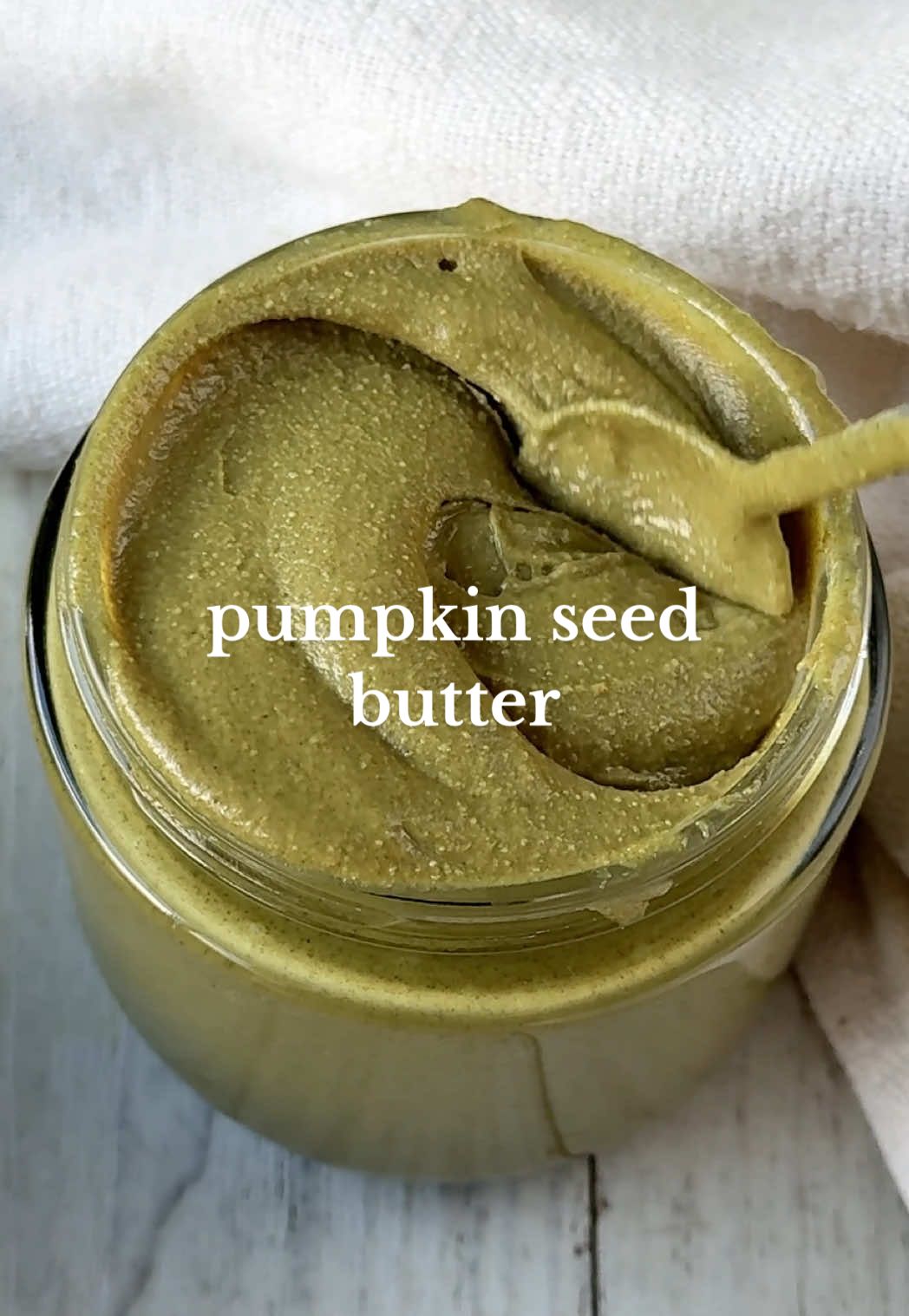 Pumpkin Seed Butter 💚 It's a great nut-free spread alternative and you only need 1 ingredient to make it 🫶🏼 Spread it onto toast, add it onto your oatmeal or even in desserts!  Ingredients 3 cups pepitas/pumpkin seed kernals  *Optional add ins: Sea salt, sweetener of choice, cinnamon Method: 1.  Preheat oven to 180°C. Spread the pumpkin seeds out onto a lined baking tray and bake for 5-10 minutes or until lightly golden.  2. Add into a blender or processor and blitz until it becomes a fine meal. Use a spoon to scrape down the sides as needed and then continue the process on low to medium speed until the seeds release their natural oils. It should eventually become a smooth and runny paste. This can take up to 20 minutes depending on your appliance. NOTE: If using a blender, a tamper is a MUST otherwise it won't blend properly. A processor would usually be the better/easier option!  3. Transfer into a clean airtight jar. Enjoy! #vegan #plantbased #EasyRecipe #pepita #pumpkinseeds 