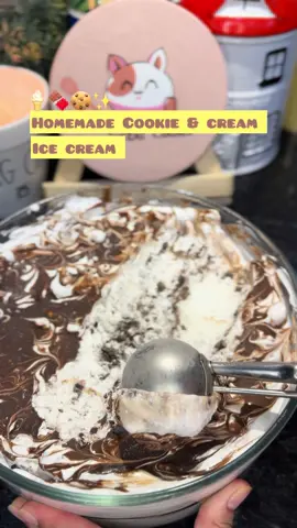 Make homemade Cookie & Cream icre cream without using machine🤌🏻🤤  Cookies and Cream Ice Cream 🍦🍪🍫 Ingredients •Whipping cream •Condensed milk •Biscuits (crushed) •Chocolate •Butter •Cream •Milk Instructions: In a large bowl, combine whipping cream and condensed milk. Beat until stiff peaks form.Crush the biscuits and fold them into the cream mixture.To make the chocolate sauce, melt chocolate with butter, cream, and milk, stirring until smooth.In a container, layer as  •Cream mixture •Crushed biscuits •Chocolate sauce Repeat the layers until all ingredients are used.Cover and refrigerate overnight.Scoop, serve, and enjoy your homemade cookie and cream ice cream. #viral #cookieandcreamicecream #icecream #homadeicecream #fyp 