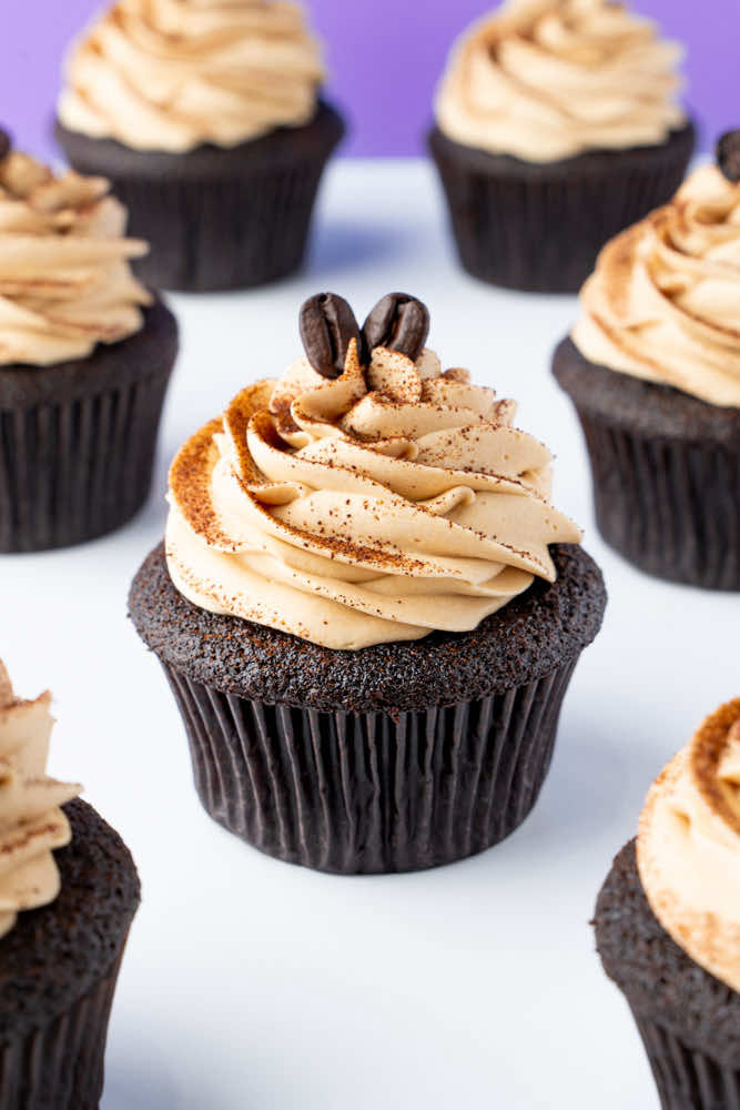 Coffee + chocolate = the coziest cupcake combo ever ☕🍫🧁 These mocha cupcakes are rich, fluffy, and topped with smooth coffee buttercream—basically your favorite latte in dessert form. Perfect for chilly days, warm mugs, and sweet fall cravings 🍂✨ Recipe on cakemehometonight.com!