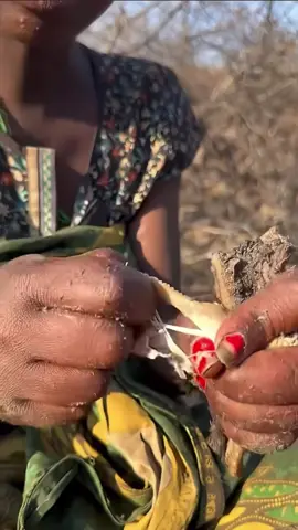 HOW CUTE IS THIS SWEET BABY FROM THE HADZABE TRIBE. MOM FEEDING HER BABY