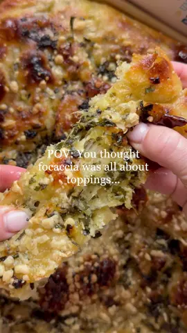 This stuffed focaccia is crispy on the outside and pillowy soft inside, bursting with garlic butter, fresh herbs, and stretchy cheese in every bite. SAVE this recipe for easy access later! Ingredients: *4 cups Arrowhead Mills Unbleached Bread Flour *1 ¾ cups warm water *1 ½ tsp instant yeast *1 tsp sugar, honey, or agave *¼ cup extra virgin olive oil, plus more for drizzling *2 tsp fine sea salt *6 tbsp unsalted butter, melted *2 tbsp garlic paste (or finely grated fresh garlic) *1 cup shredded mozzarella (or cheese of choice) *2 tbsp fresh herbs (rosemary, thyme, parsley), chopped *Flaky sea salt or finely grated Parmigiano Reggiano cheese, for sprinkling Instructions: 1. In a large bowl, whisk warm water, yeast, and sugar. Let sit 5 minutes until foamy. 2. Stir in olive oil, Arrowhead Mills Unbleached Bread flour, and salt. Mix until a shaggy dough forms. Knead 5–7 minutes until smooth. 3. Place dough in an oiled bowl, cover, and let rise until doubled (about 1 hour). 4. In a pan over medium heat, add butter, oil, garlic paste, and herbs til fragrant. Set aside to cool 5. Grease a 9x13 pan with olive oil. Place the dough into the pan. Brush generously with garlic butter and scatter shredded cheese. Fold into itself.  6. Cover and let rise 30–40 minutes until puffy. 7. Use fingertips to dimple the surface. Drizzle with olive oil and remaining garlic butter. Sprinkle on more cheese. Bake at 425°F for 20–25 minutes until golden brown. 8. Cool slightly, slice into squares, and watch the garlic butter and cheese ooze out! #focaccia #bake #bread #homemade #realfood 