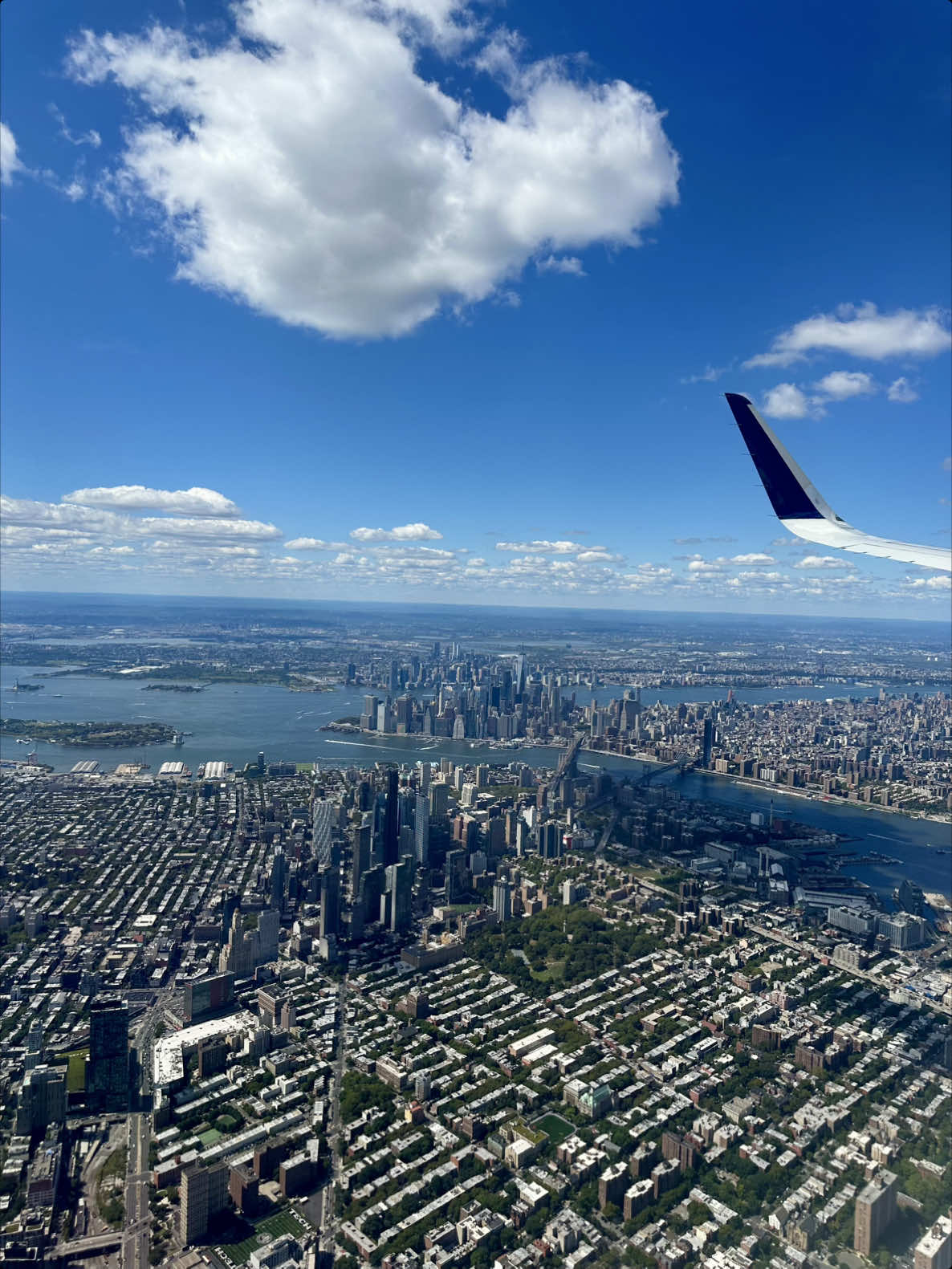 It’s been over a decade since I’ve been in New York City, but something about flying over Manhattan just makes me feel alive again. Maybe it’s all the memories I have here. Maybe it’s the feeling that I never left. Or maybe it’s the excitement of what’s to come. ✈️🏙️ #travel #traveltiktok #nyc #newyork #newyorkcity 