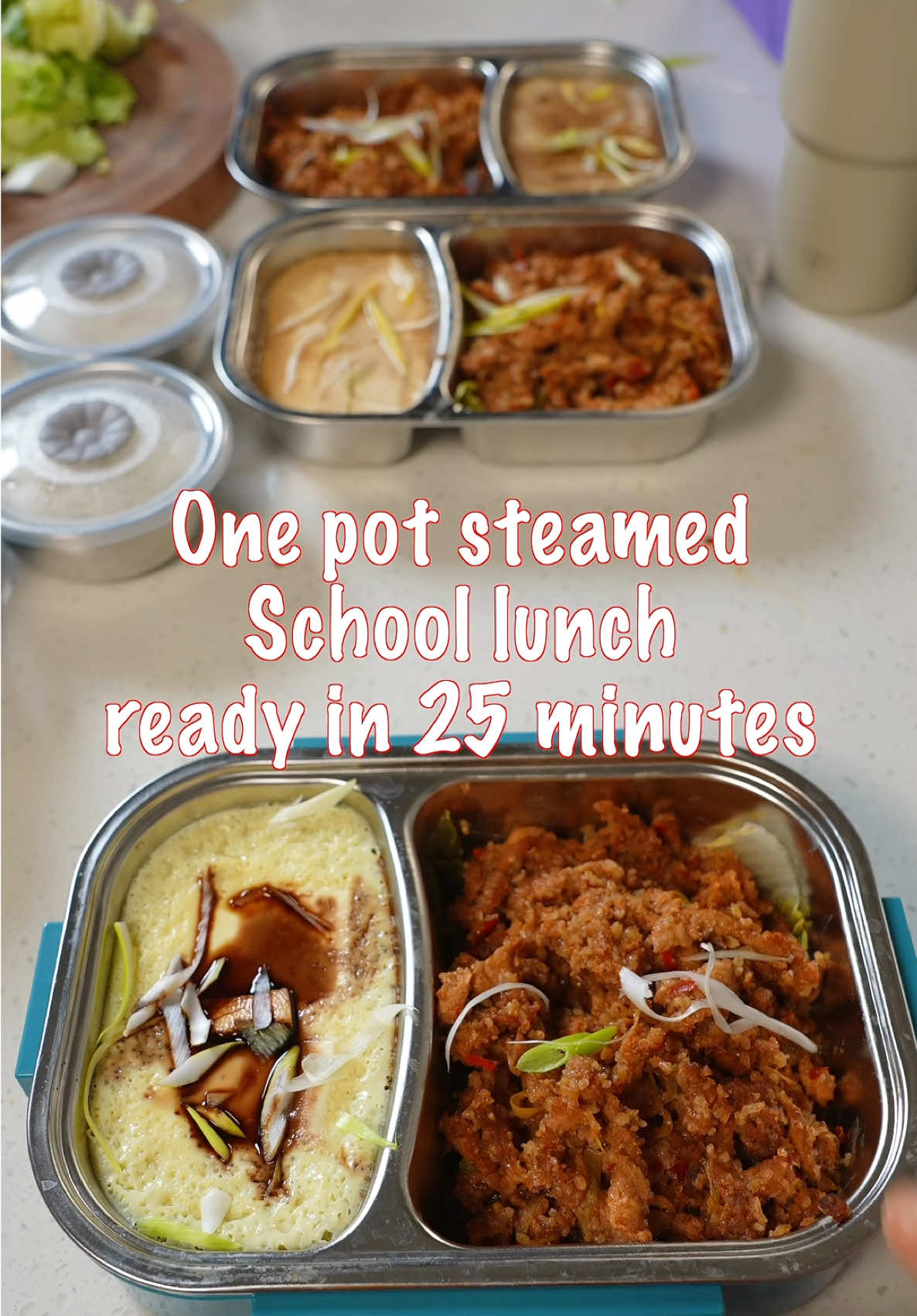 One pot. Three dishes. School lunch done in 25 minutes. This is Chinese Mom School Lunch Series, where I show you real meals my kids take to school.  Today’s recipe is a full steamed meal: marinated pork with rice powder, Napa cabbage, and silky egg custard, all cooked together in one steamer. No frying, no oil splatter, no stress. Check out the full recipe on my website → Cookingbomb.com More lunchbox ideas coming soon!  And also check out my new cookbook: Traditional Chinese Wellness Recipes, pre order your copy now! #cookingbomb #chinesefood #schoollunchbox 