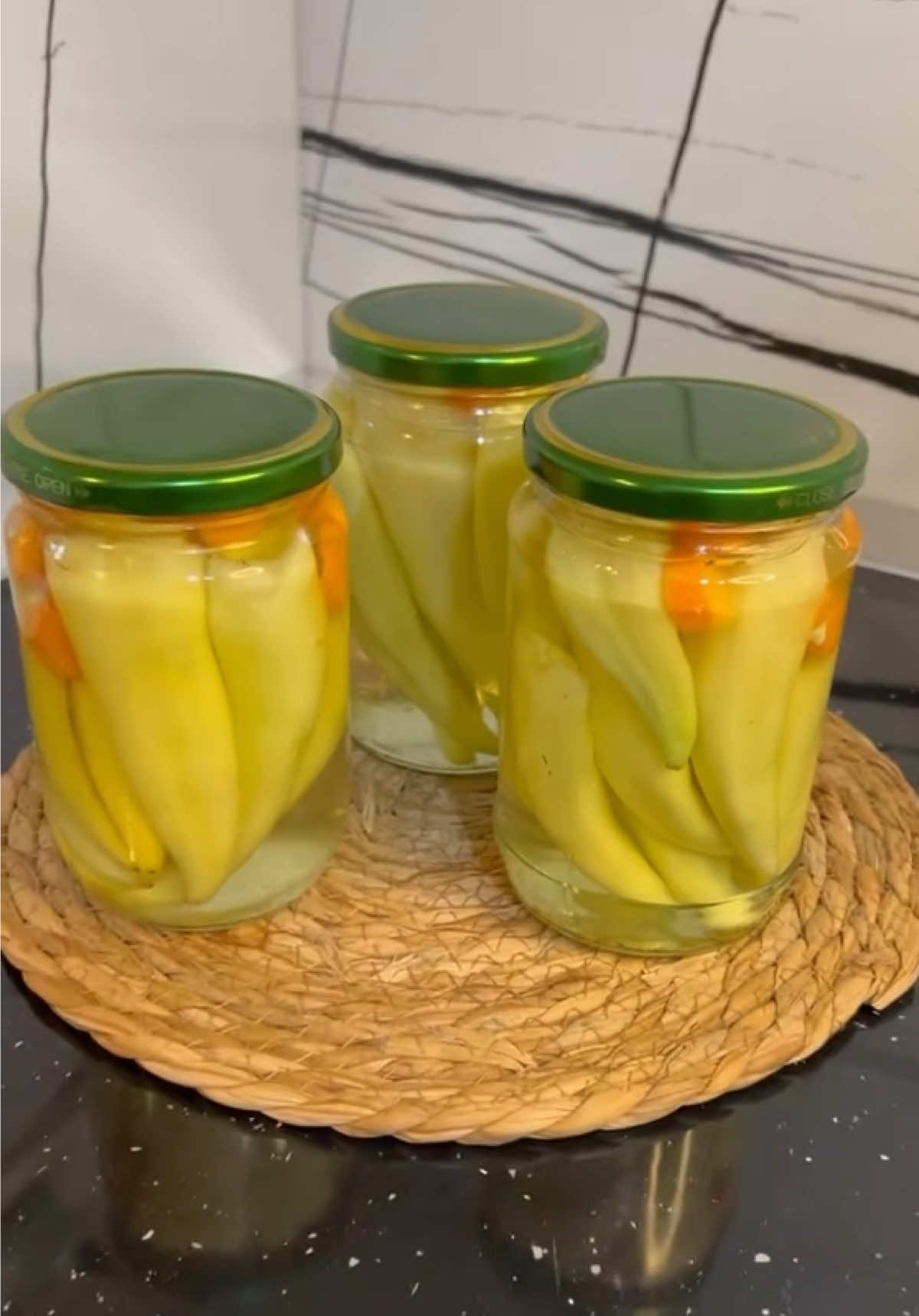 ✨ Speca Turshi – Receta nga vjerra ime ✨ Turshi e lehtë, me pak përbërës por me shije të mrekullueshme! 🌶️🥕 Përbërësit: 	•	1 kg speca 	•	1 lugë çaji veget (në secilin spec) 	•	3-4 karrota Për ujin: 	•	1.5 L ujë 	•	2 lugë gjelle kripë e trashë 	•	3 lugë sheqer 	•	1 filxhan uthull e bardhë (9%) Përgatitja: 1️⃣ Lajmë e pastrojmë specat nga bishtat dhe farat. 2️⃣ Në secilin spec vendosim nga 1 lugë çaji veget (ose gjysmë luge nëse janë të vegjël). 3️⃣ I rendisim në kavanoz, sipër shtojmë karrotat (ose pa karrota sipas dëshirës). 4️⃣ Përgatisim ujin: në tenxhere hedhim ujë, kripë, sheqer dhe uthull. Përziejmë derisa të tretet kripa, e lëmë të vlojë. 5️⃣ Ujin e nxehtë e hedhim mbi specat në kavanoz, i mbyllim mirë. 6️⃣ I ruajmë në vend të freskët e të errët ose frigorifer. 👉 Gati për konsum pas 2 javësh, por mbahen deri në 1 vit! Video e plotne youtube KUZHINA E ARBRESHES linku ne BIO !!  #RecetaShqiptare #turshi #Receta #kuzhinaearbreshes #HomeCooking 