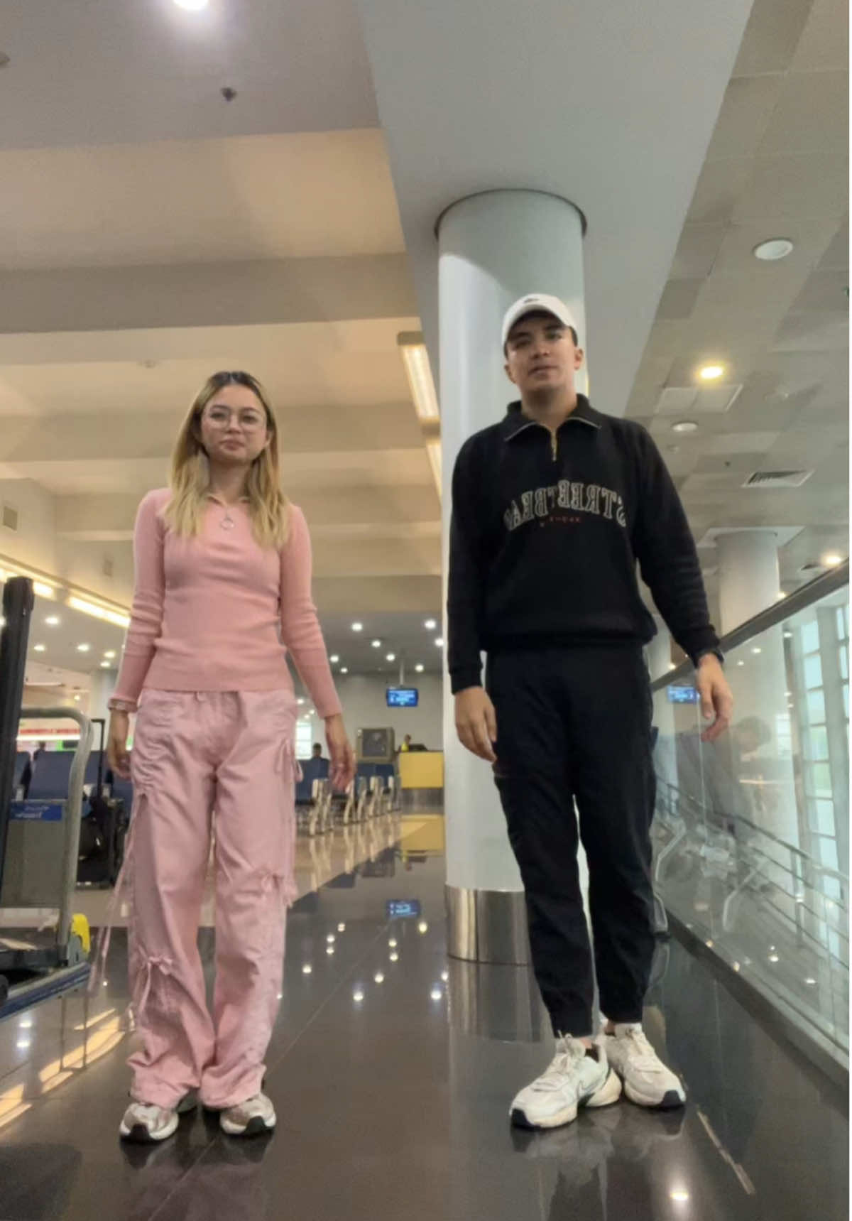 fit check with my travel buddy 💞 #vietnamtravel #airportdiaries #travelfits #coupleoutfit #traveldiary #hochiminh #xinchao #fitok 