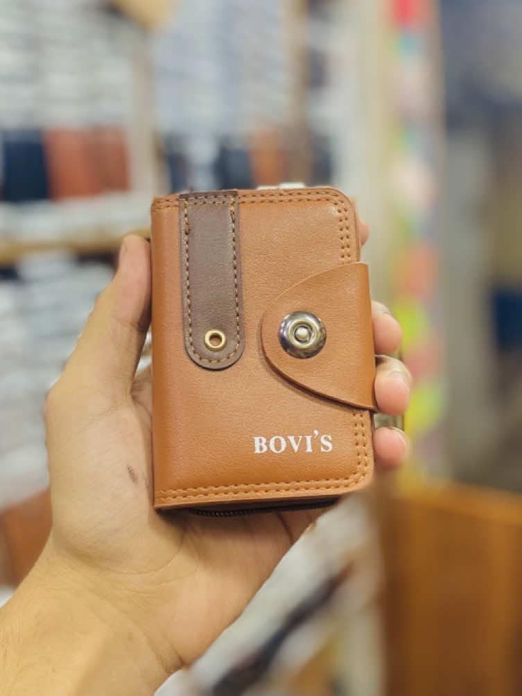 👜 Genuine Leather Wallet – Premium Quality ✔️ Brand: BOVI’S ✔️ Material: High-Quality Genuine Leather ✔️ Design: Bi-fold with button closure ✔️ Color: Brown (two-tone finish) ✔️ Inside: Multiple card slots Spacious cash compartment Zipper pocket with accordion-style dividers (for coins, cards & receipts) ✔️ Compact & Stylish – Perfect for everyday use ✔️ Durable stitching & secure closure ✨ Best for men who need a slim yet spacious leather wallet. 🎁 Ideal gift choice for birthdays, anniversaries & special occasions.