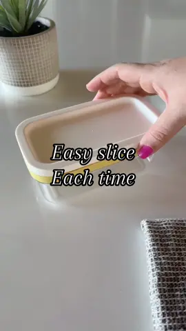 This butter dish and slicer is a game changer if you love to bake or cook. It gives you perfectly cut pats each time, and then you can easily store it in the container in your fridge. ##bakinghack##cookinghack##butterdish##kitchengadgets
