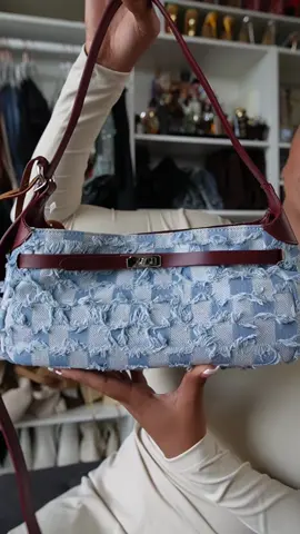 This bag is the perfect blend of edgy and chic. Designed with a patchwork denim body and frayed detailing, it brings a unique texture that instantly stands out. The deep burgundy leather straps and accents add a luxe contrast, giving it both casual cool and elevated style. Versatile enough to pair with everyday denim or dress up for a statement look, this bag is a must-have for fashion lovers who like to mix classic with bold. #DenimBag #PatchworkBag #FrayedDenim #StreetStyleBag #ChicAccessories          