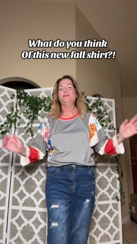 This fall top is very snazzy is a color block top with three-quarter batwing sleeves, super comfy, and fun! #fallfashiontrends #funfashion #fashionover40 #teacherfashion #comfyclothes 