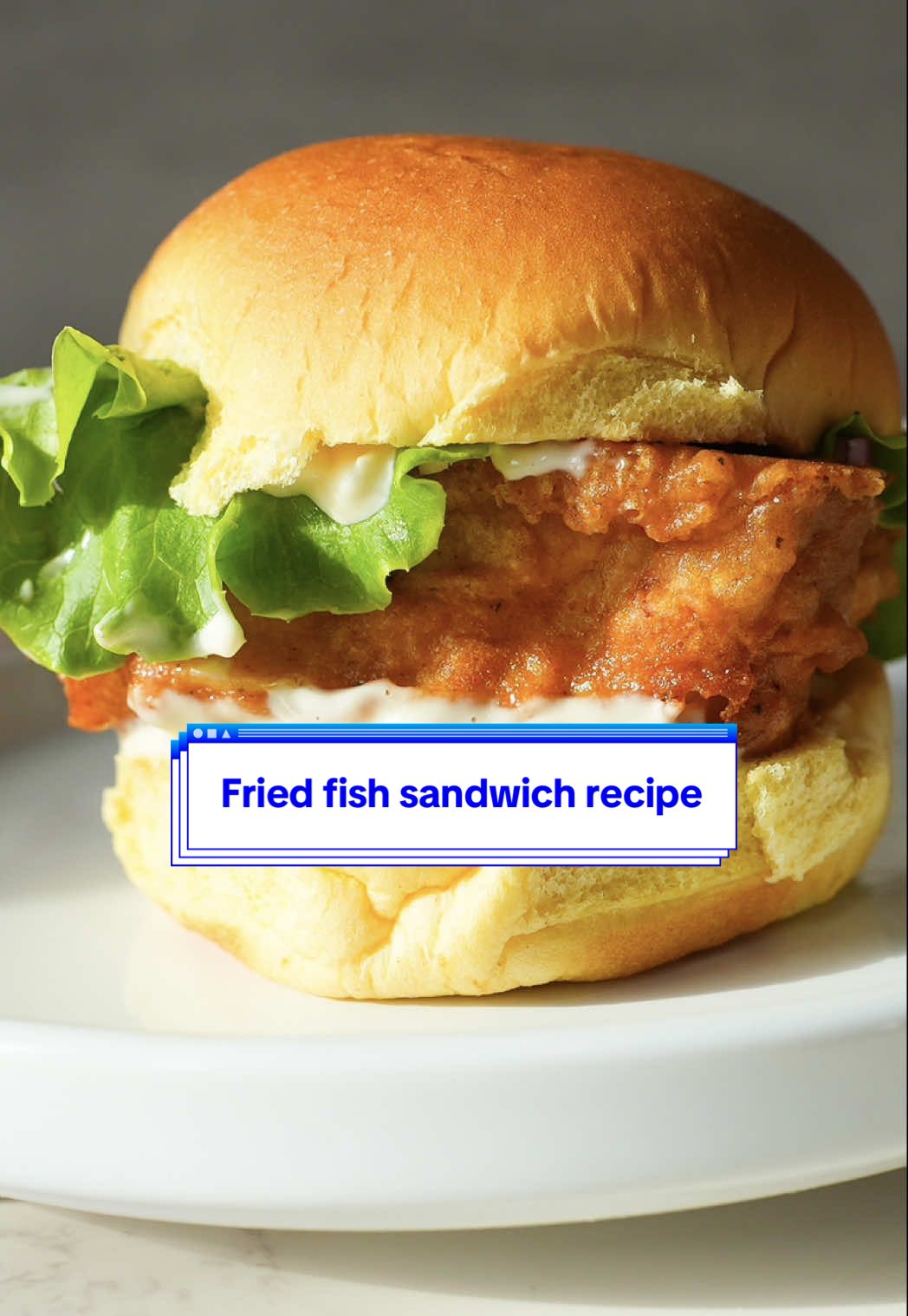 Fried fish sandwich recipe. The full recipe is on my blog!  For the fish: 1 lb cod fish filet Salt Black pepper For the batter: 1 cup all-purpose flour 1 tsp paprika 1 tbsp Cajun seasoning 2 tsp garlic powder 1 tsp cayenne pepper 2 eggs, whisked 1¼ cup beer (I used Modelo) For the tartar sauce: ¼ cup mayonnaise Fresh lemon juice (about 1 teaspoon) 1 tsp chopped fresh dill 1 tsp Dijon mustard 1 tbsp sweet relish