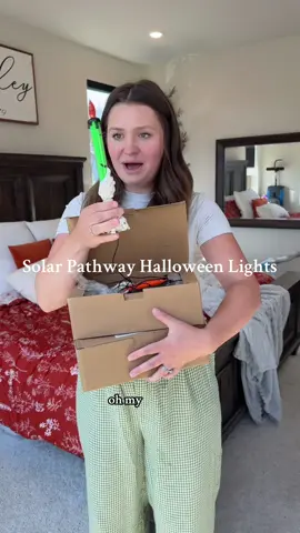 Obsessed that the candles are fun Halloween colors! #halloweenlights #pathwaylights #outdoorlighting #halloweendecor #decorations