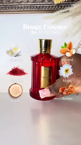 ROMASS Rouge Essence Luxe Perfume Notes: 	•	Top: Saffron, Jasmine 	•	Heart: Amber 	•	Base: Woods, Almond This fragrance is pure luxury in a bottle.  Rouge Essence opens with the bold spice of saffron, softened by a touch of jasmine that makes it instantly captivating.  The heart is a warm amber glow, rich, sensual, and completely enveloping.  As it settles, the base reveals smooth woody tones wrapped in creamy almond, leaving a deep, addictive trail that lingers for hours on the skin. Unisex, fearless, and opulent, this is a scent made for those who want their fragrance to speak before they do.  The red-and-gold bottle is just as striking as the scent itself. #RougeEssence #RomassPerfume #LongLastingFragrance #UnisexPerfume #LuxuryFragrance     