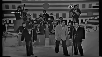 Billos Caracas Boys la Orquesta Más Popular De Venezuela  Tema: Así Así En vivo  canta: Cheo García  coros: Ely Mendez, Memo Morales, Billo Frometa  director: Billo Frometa  pianista: Stelio Bosch Cabruja  programa: De fiesta Con venevisión 1975