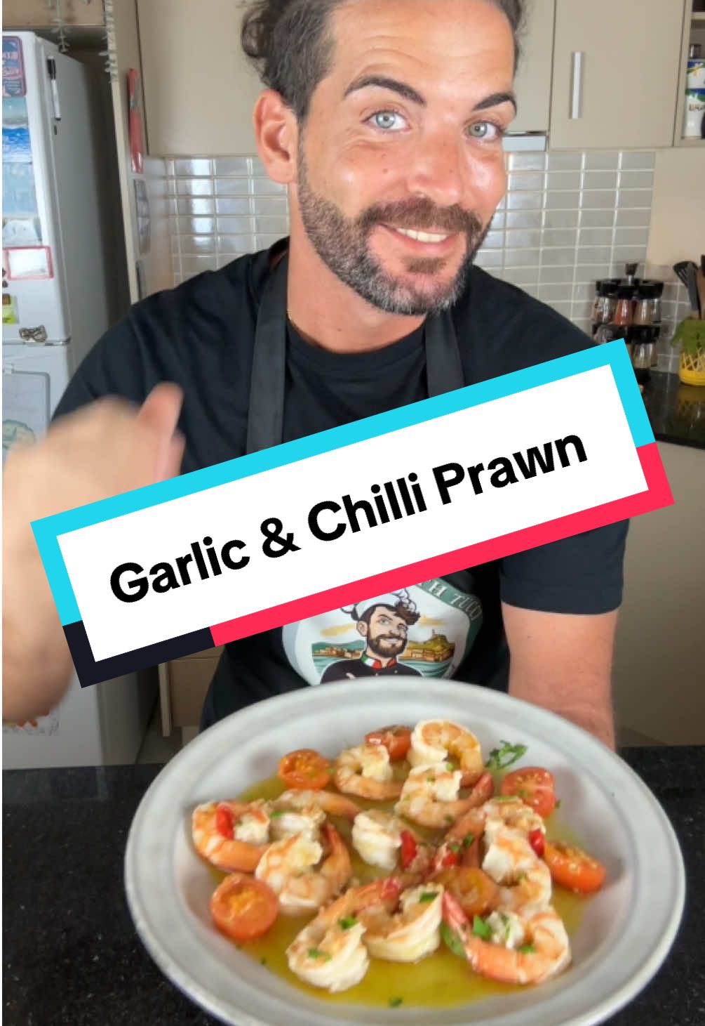 Garlic & Chilli Prawns | Juicy, Spicy & Packed with Flavour This is one of the simplest yet most irresistible Italian-style seafood entrées. Juicy prawns, garlic, chilli, white wine, and fresh parsley come together in minutes — perfect as a starter or with crusty bread to soak up the sauce. Ingredients (serves 2–3): 	•	350g fresh prawns (cleaned, tails left on) 	•	3 cloves garlic (core removed, diced thin) 	•	3 cherry tomatoes (halved) 	•	1 glass white wine 	•	1 fresh chilli 	•	Fresh parsley 	•	Olive oil & salt to taste Instructions: Peel and clean prawns, leaving tails attached. In a cold pan, add olive oil, diced garlic, and chilli. Sizzle gently. Add prawns, cherry tomatoes, and white wine. Cook prawns for about 1 min per side until pink and juicy. Finish with fresh parsley and serve immediately. Full recipe and more Italian favourites 👉 www.cookingwithtucci.com #cookingwithtucci #garlicprawns #chilliprawns #italianseafood #EasyRecipes    