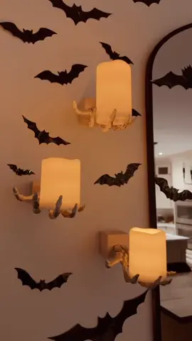 DIY skeleton sconces #DIY #halloweendiy #skeletondecor #halloweendecor #onthisday 