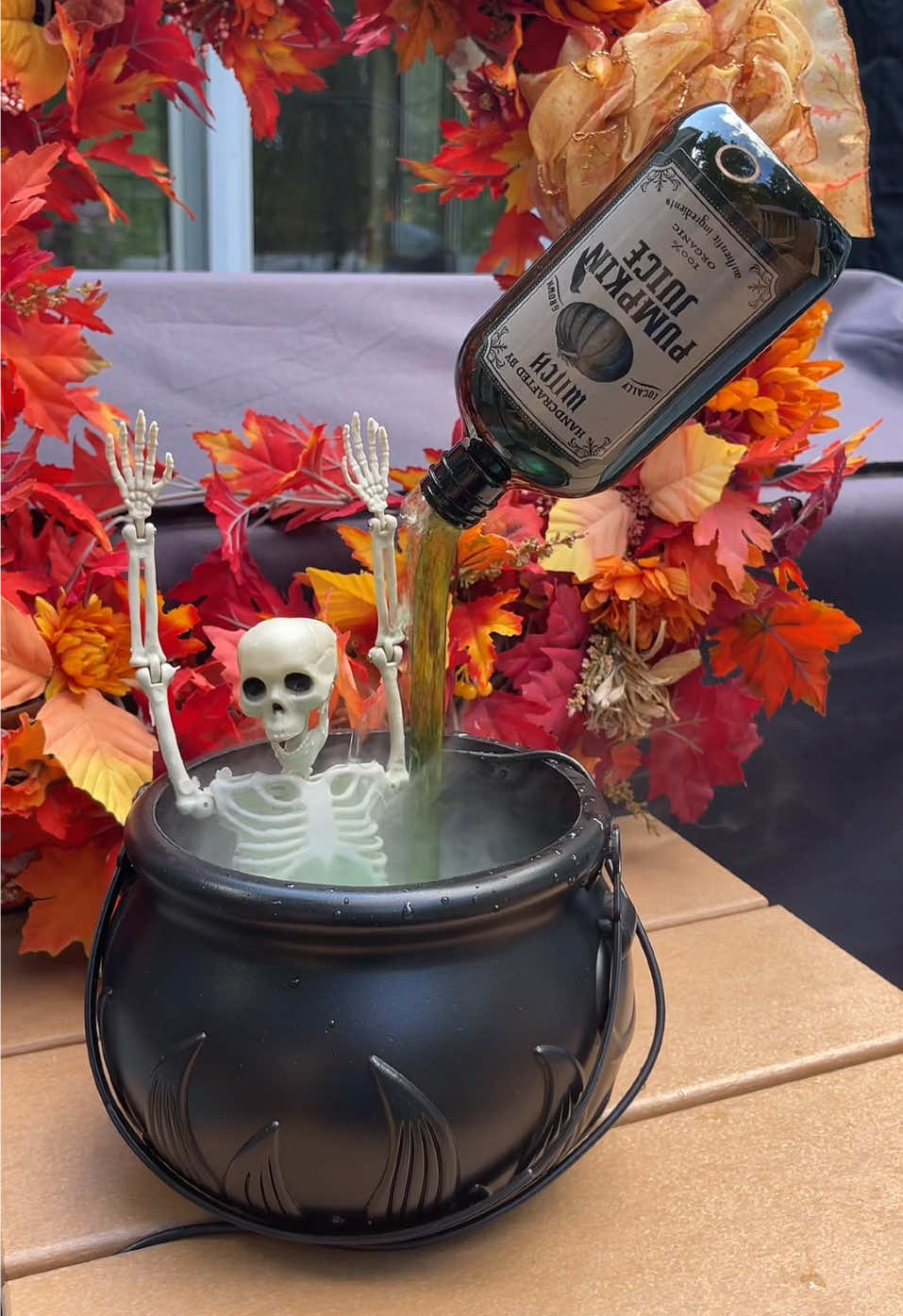 Such a fun decoration for Halloween! It will keep the kids and the adults guessing! #skeleton #halloweendecor #halloweenfun #cauldron 