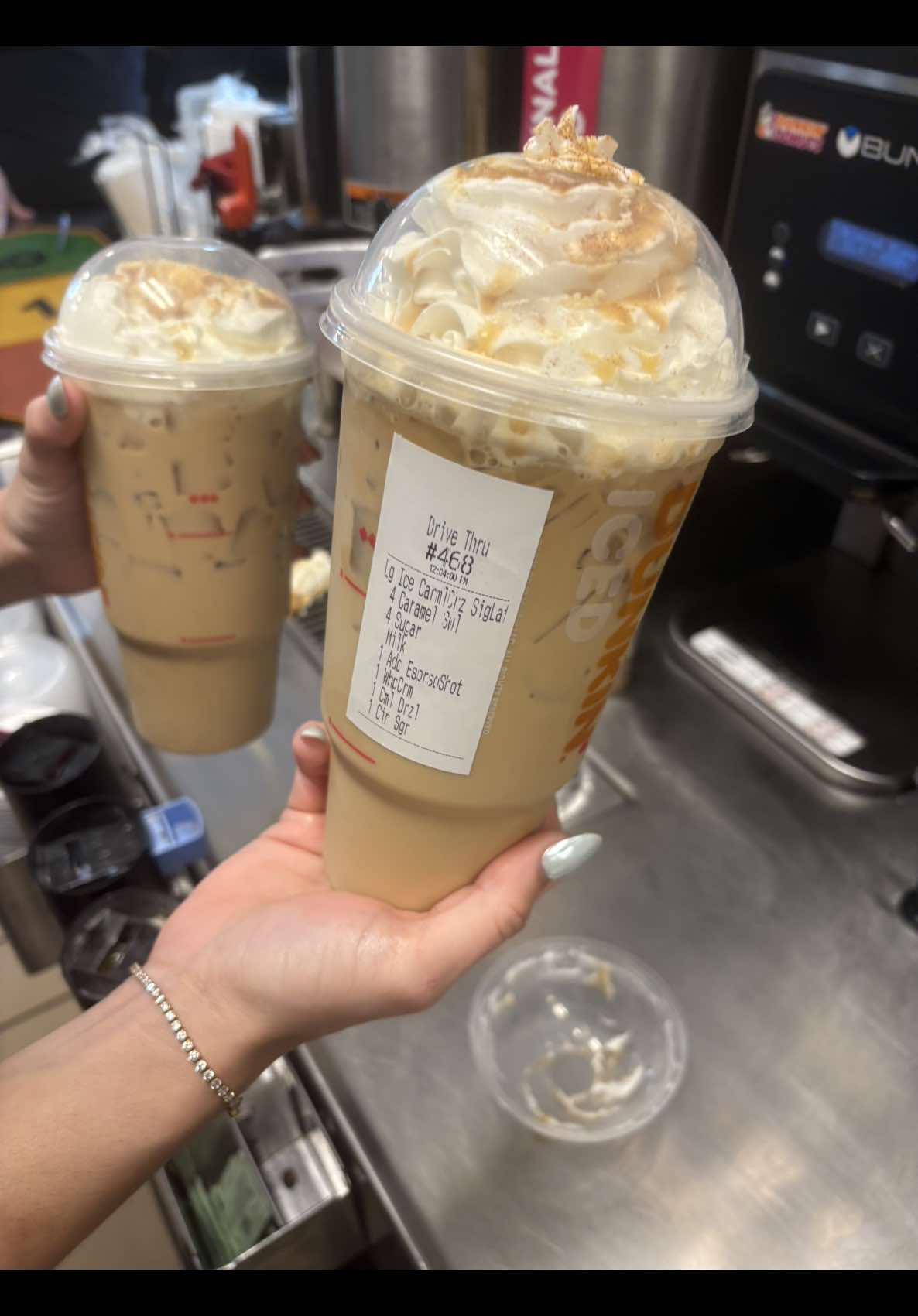 @Dunkin'  How to make an iced caramel craze signature latte ? Lg Carml Dzr Siglat 4 caramel swl  4sugar  Milk Whp Crm  Cml Drzl Cin Sgr #dunkindonuts #latte #caramel #icedcoffee #espresso 