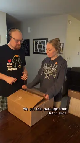 Unboxing a gift! Trent loves the merch and gift cards. Thank you, @Dutch Bros Coffee #autismsiblings