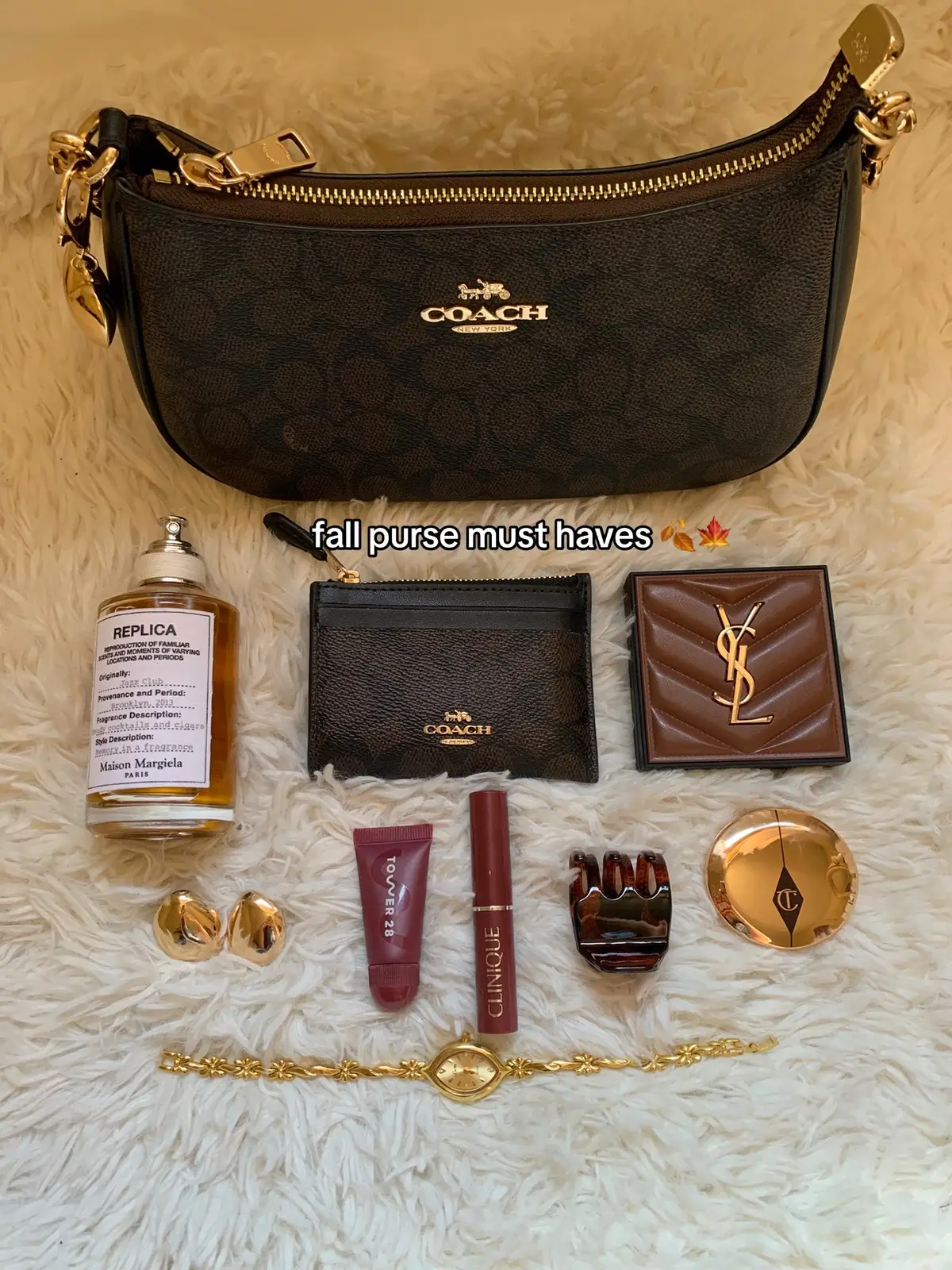 @Coach @YSL Beauty @Charlotte Tilbury @Clinique @maisonmargielafragrances @Tower 28 Beauty #fallbag #whatsinmybag #makeup #bagessentials #fallaesthetic 