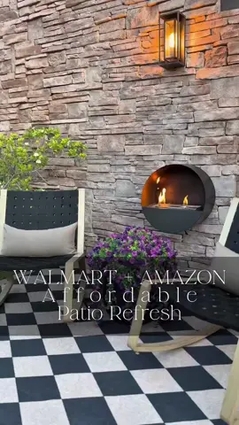 There’s nothing like a fresh patio moment for those crips fall moments✨ Starting with this 5-star rug that lays beautifully, paired with cozy rocking chairs in a thick woven pattern that’s just stunning! Oversized pots and these are faux flowers? They look so real!! And the pillows tie everything together so perfectly! 🤎 #WalmartFinds #AmazonHome #WalmartPatio #AmazonFinds #PatioRefresh     